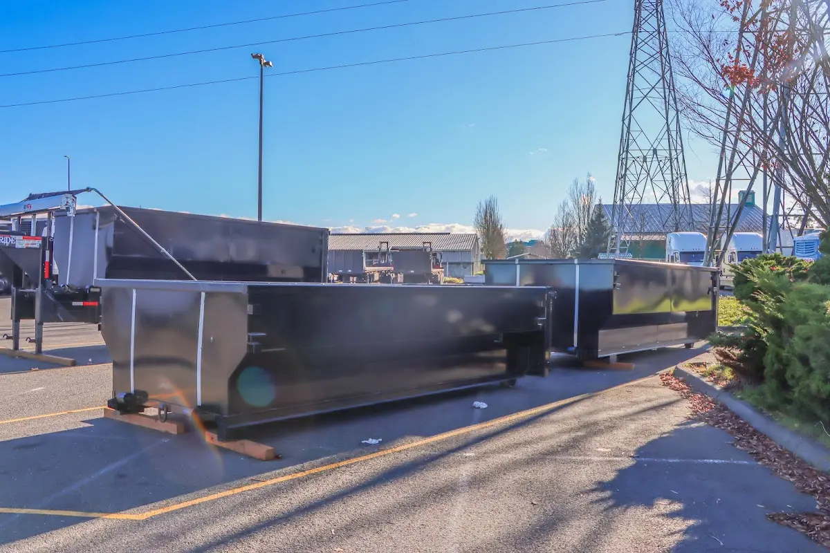 Roll-off dumpster ready for waste disposal at job site for 12 Yard Dumpster Rental in Windham